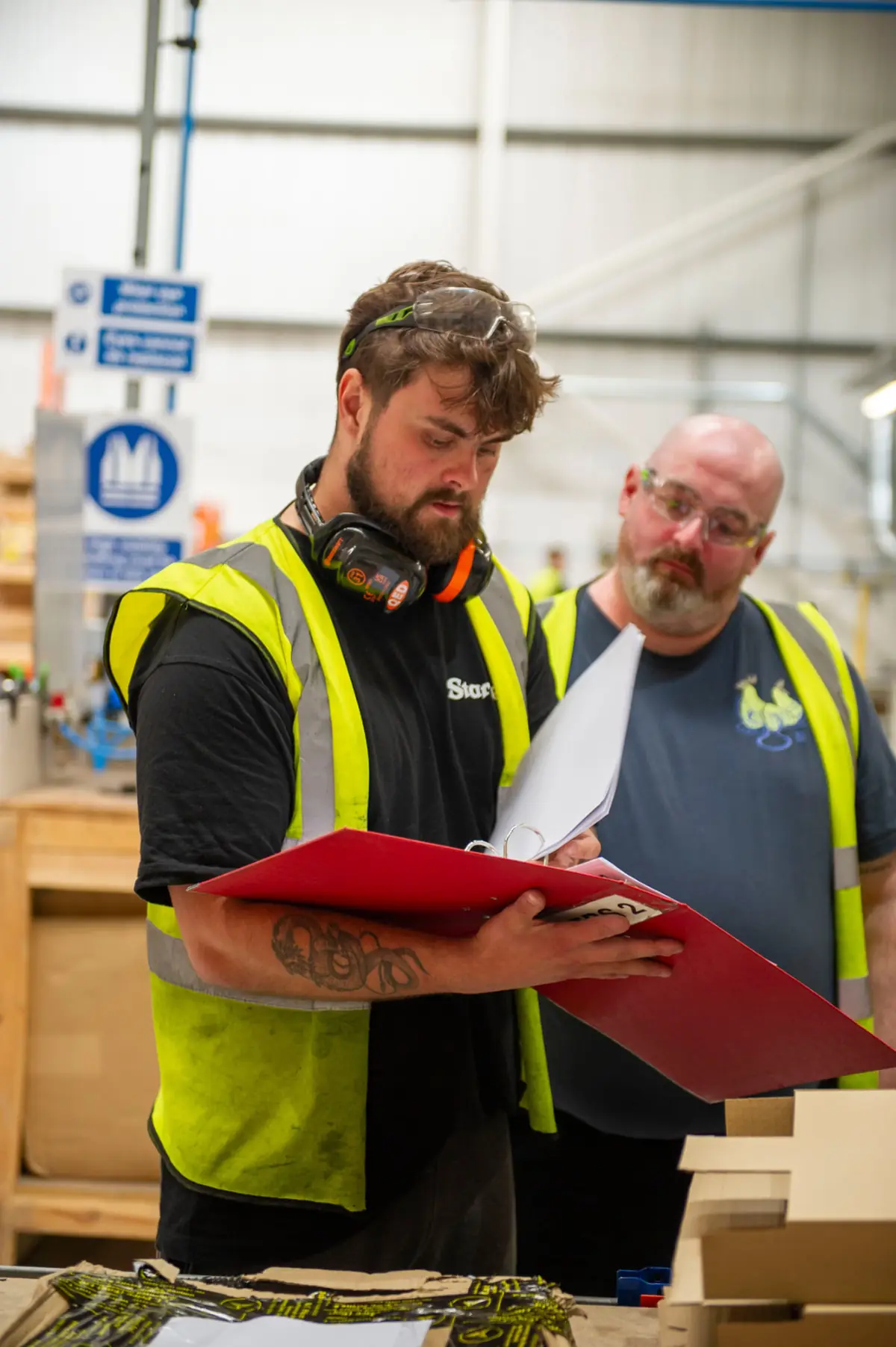 Starrett engineers reviewing a bandsaw blade specification at the Nottingham Weld Centre